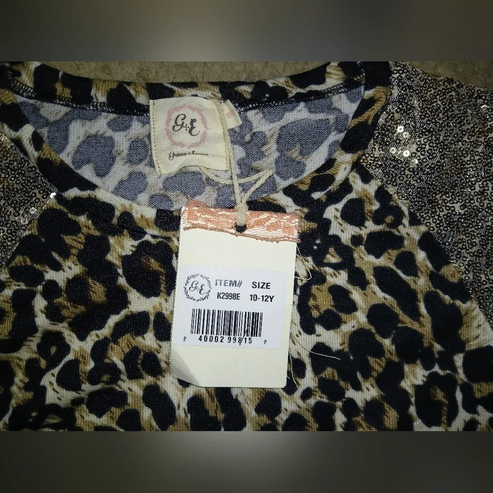 Leopard Print Sequin Shoulder Top.Grace and Emma leopard print 10/12